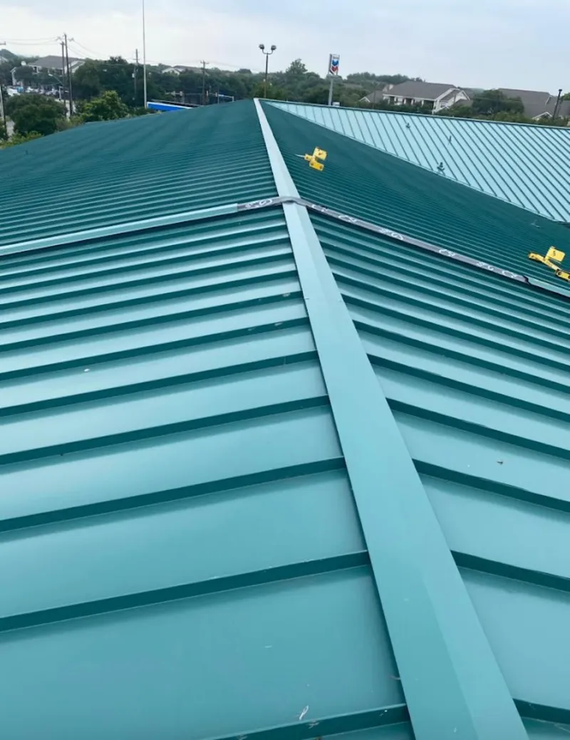 Green commercial metal roof ridge and valley for Metal Roof Repair in West Bloomfield