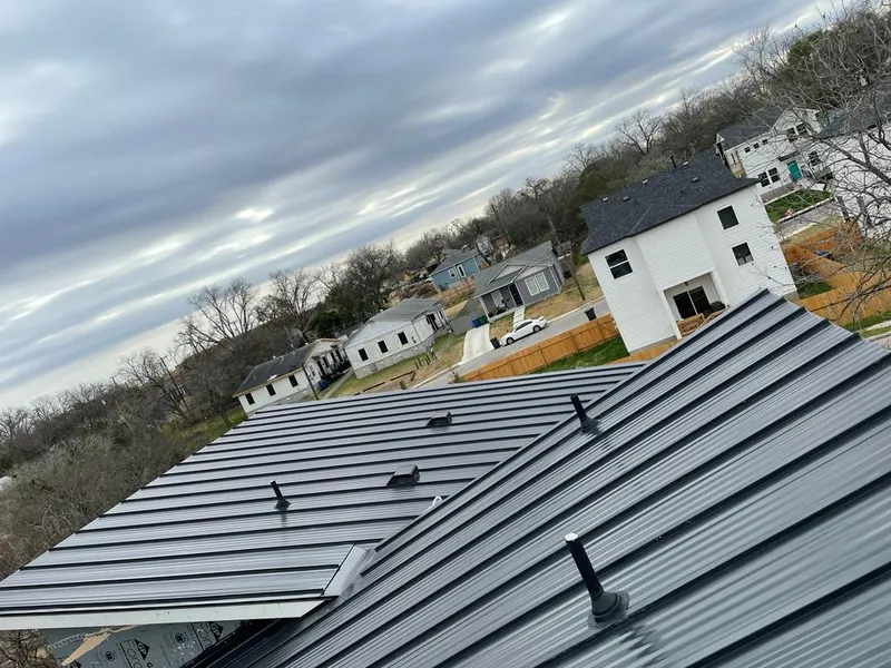 Standing seam metal roof panels with vents for Skylight Repair in West Bloomfield